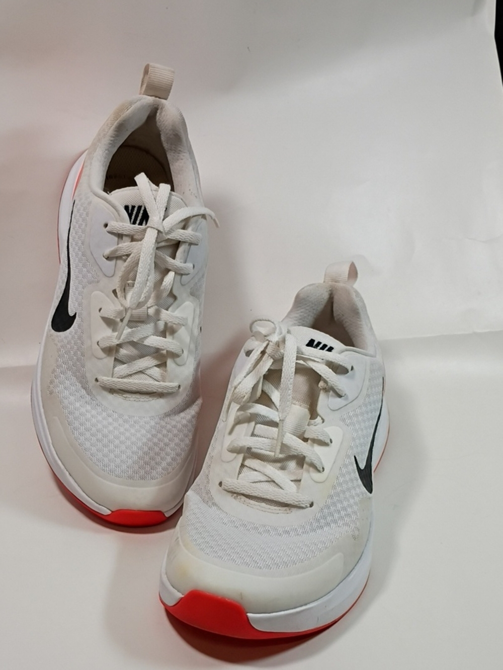 Nike Women White Athletic Sneakers with Black Swoosh and Red Accents Size  8.5